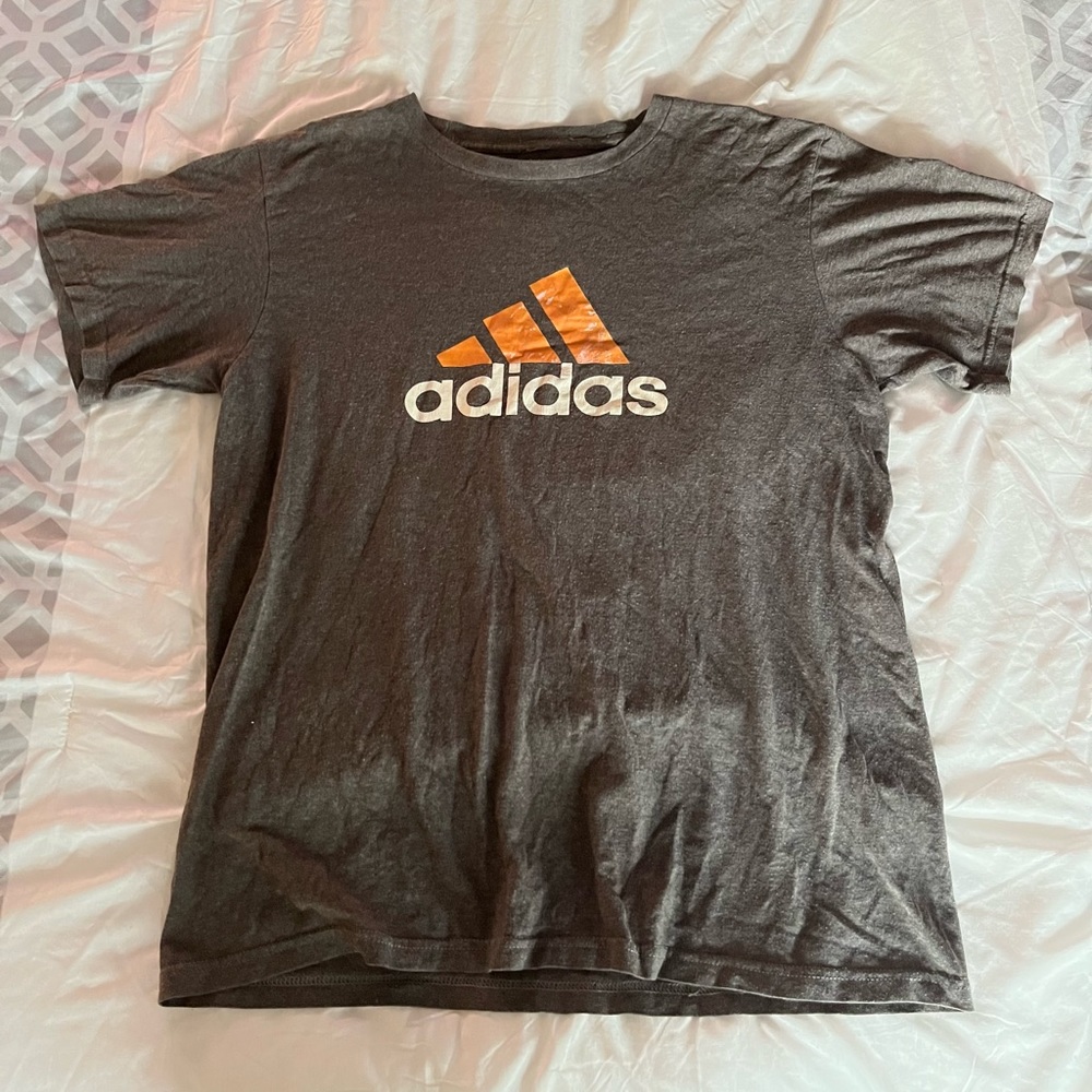 Gray t-shirt with orange Adidas logo